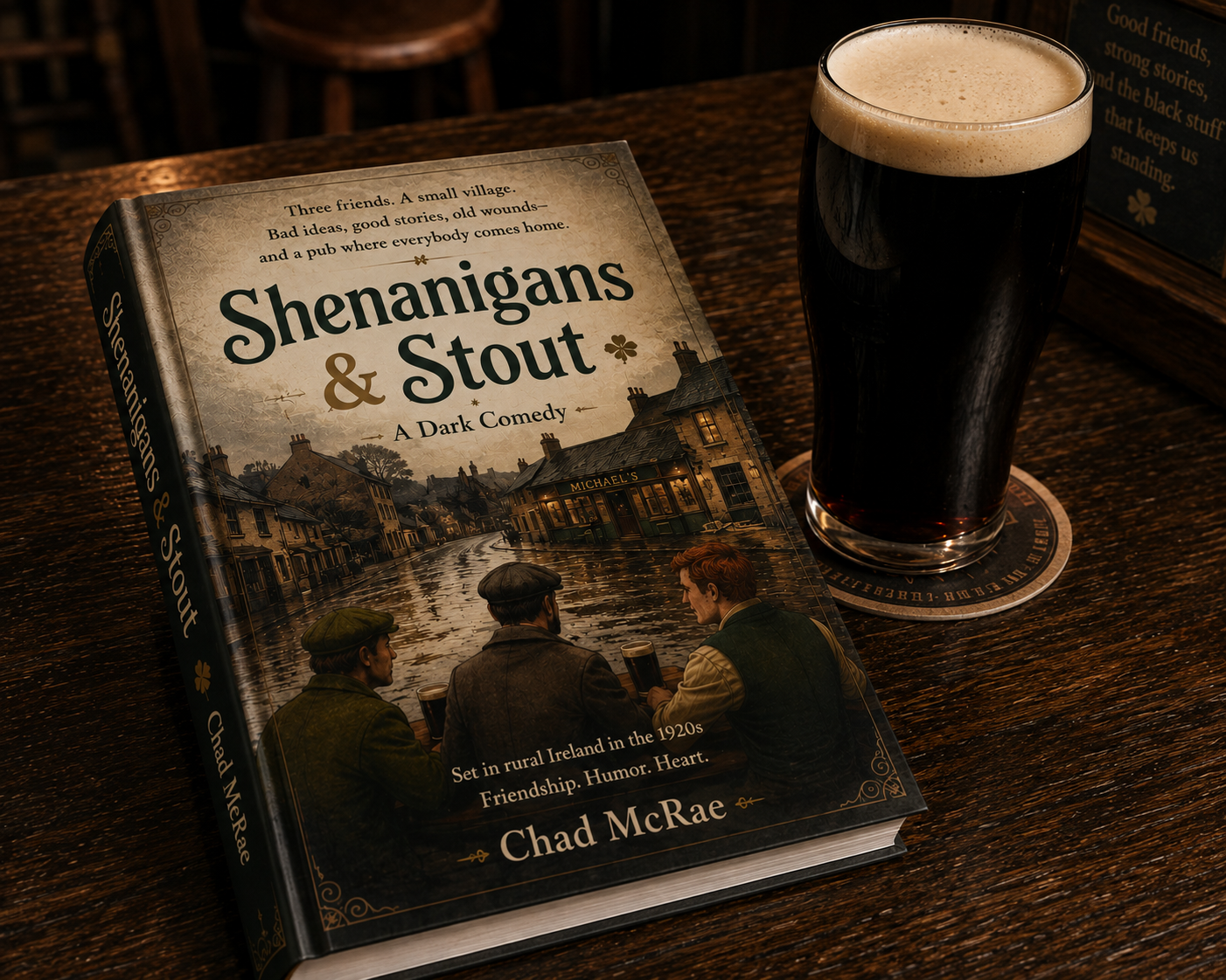 Shenanigans & Stout novel mockup on a dark wooden pub table beside a pint of stout